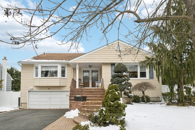 view of front of home with a garage