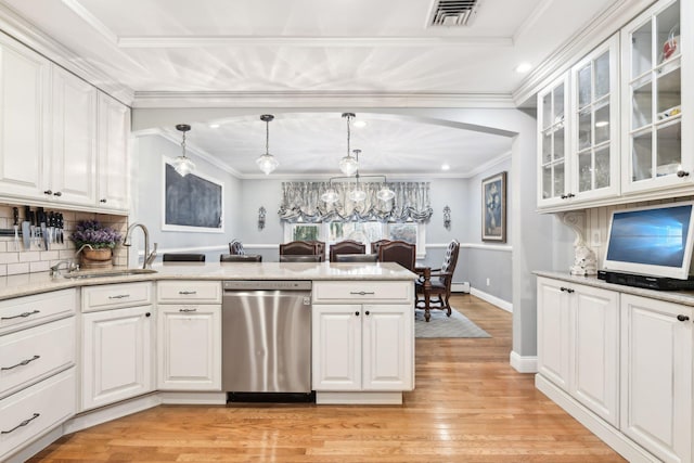 kitchen featuring sink, crown molding, decorative light fixtures, dishwasher, and white cabinets