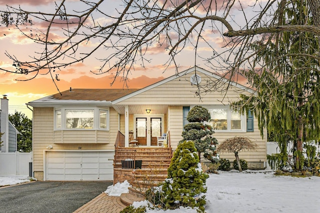 view of front of house with a garage