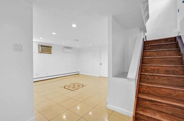 staircase featuring tile patterned floors, a wall mounted AC, and a baseboard heating unit