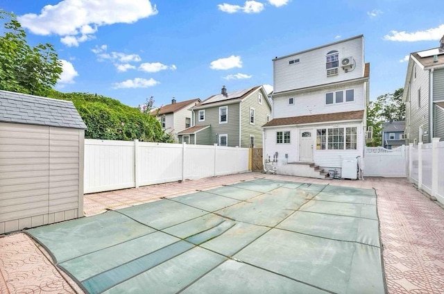 rear view of house featuring a patio