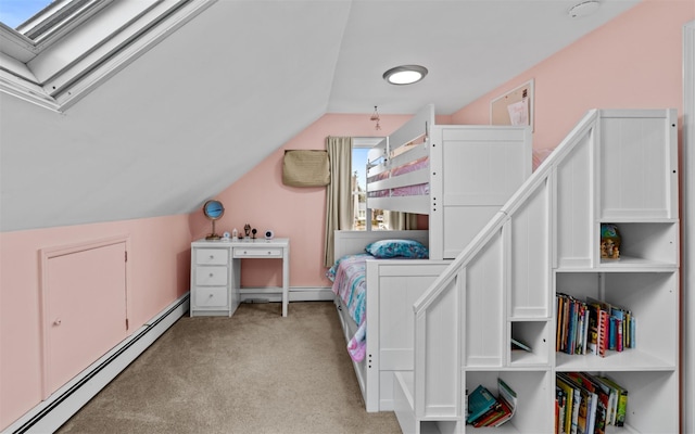 bedroom featuring light carpet, vaulted ceiling with skylight, and baseboard heating