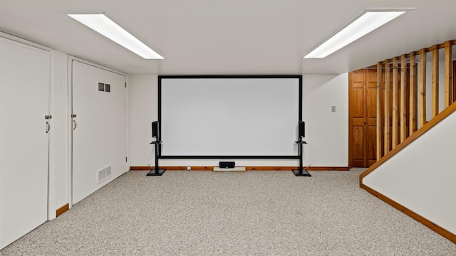 home theater room featuring carpet flooring