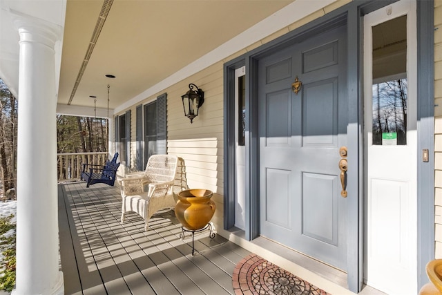 entrance to property with covered porch