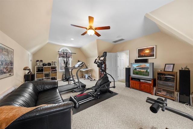 exercise area featuring vaulted ceiling, carpet flooring, and ceiling fan