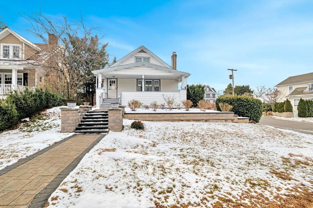 bungalow-style home with covered porch