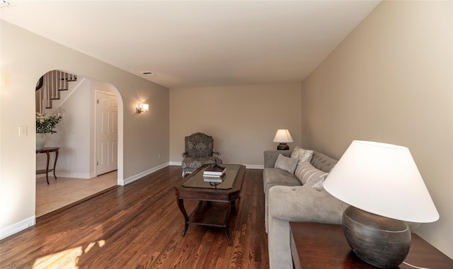 1 Regina Ct, Blauvelt, NY 10913 - living area featuring arched walkways, visible vents, baseboards, wood finished floors, and stairway