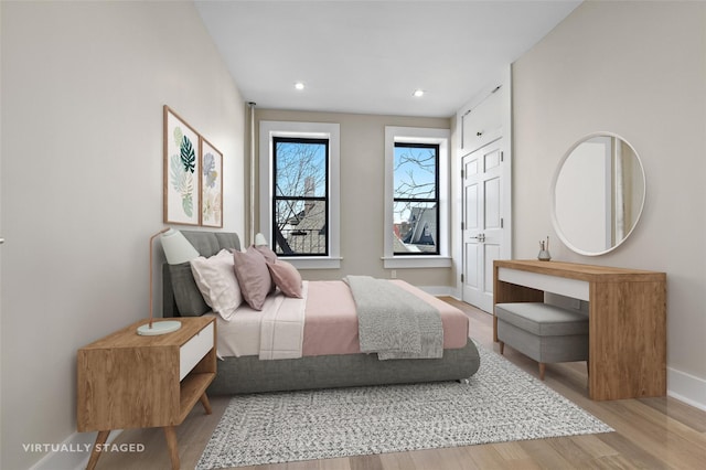 bedroom featuring hardwood / wood-style floors