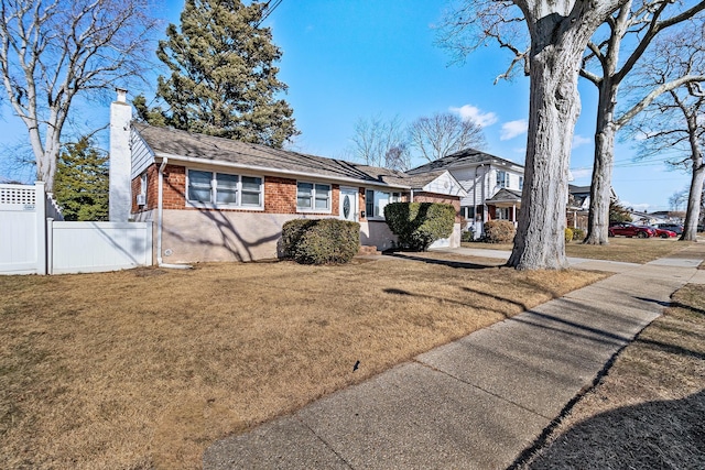 view of front of property with a front lawn