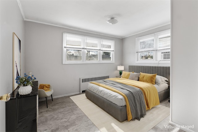 bedroom featuring light colored carpet, ornamental molding, and radiator