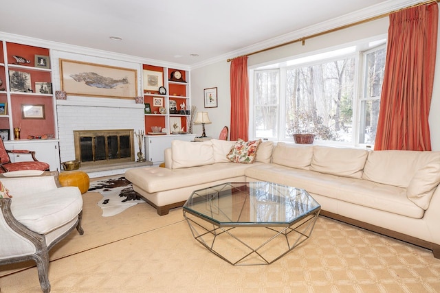 living room featuring crown molding, a brick fireplace, and built in features