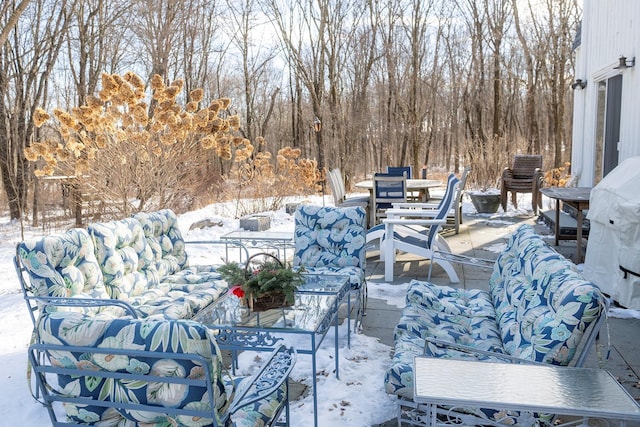 view of snow covered patio