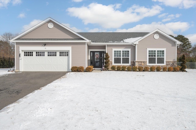 ranch-style home with a garage