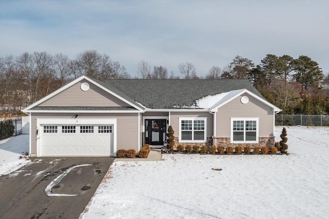 single story home featuring a garage