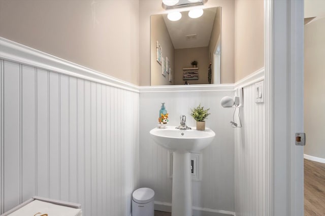 bathroom featuring hardwood / wood-style flooring