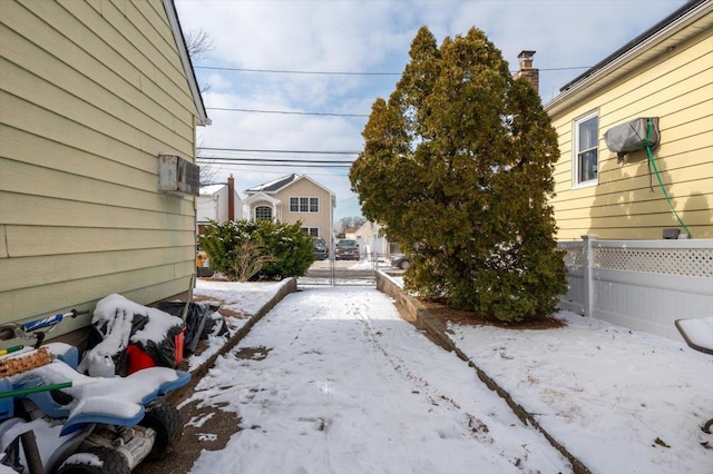 view of yard covered in snow