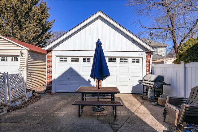 detached garage with fence