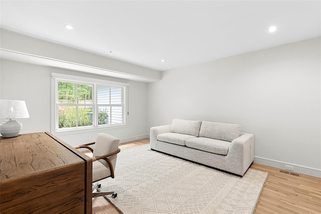 office space with light hardwood / wood-style flooring