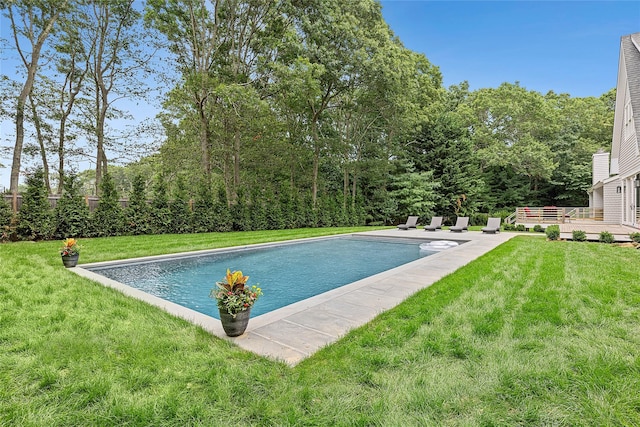 view of pool with a yard and a patio area