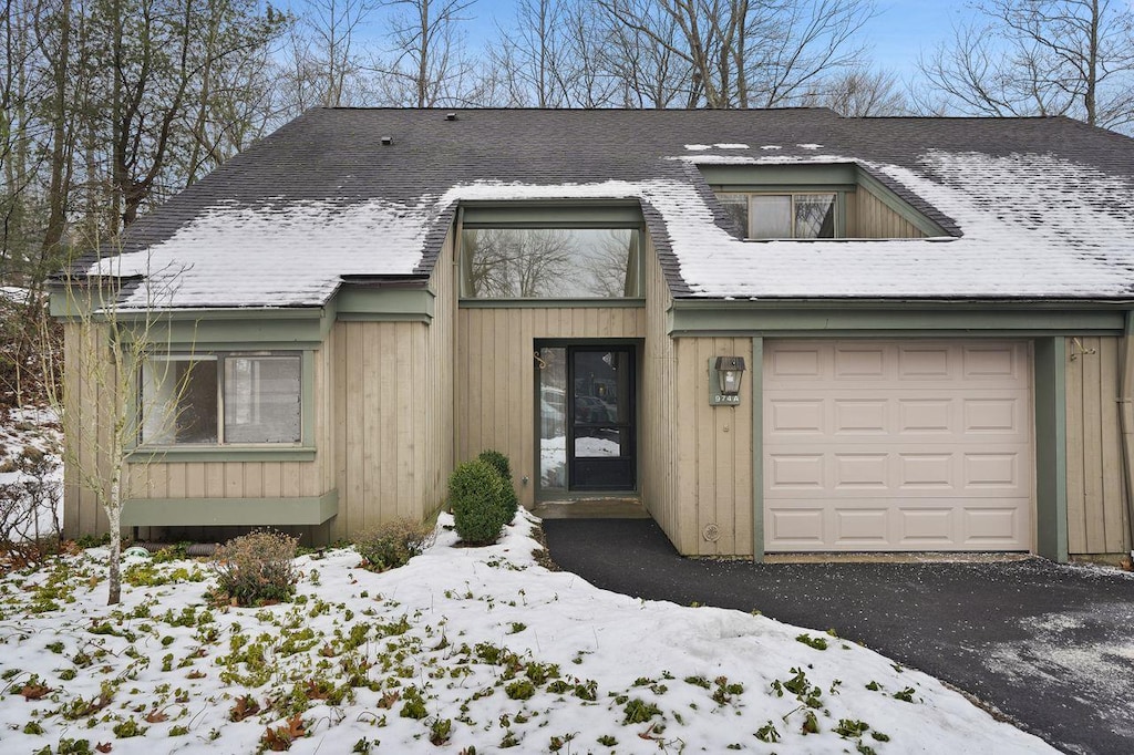 view of front of home with a garage