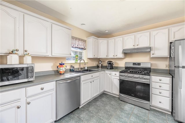 kitchen featuring sink, white cabinets, and appliances with stainless steel finishes