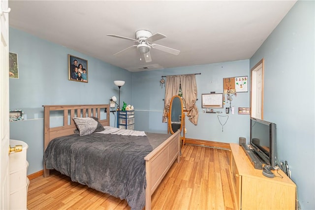 bedroom featuring light hardwood / wood-style flooring and ceiling fan