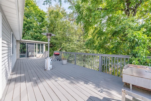 wooden terrace with a sunroom