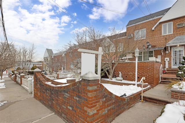 view of snow covered patio