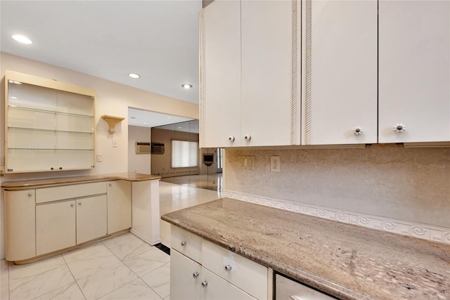 kitchen with recessed lighting, marble finish floor, decorative backsplash, and cream cabinetry