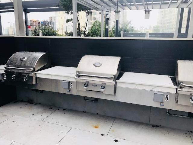 view of patio / terrace with area for grilling and a grill