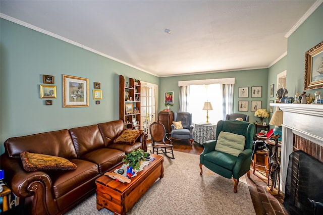 living room featuring a brick fireplace, crown molding, and hardwood / wood-style flooring