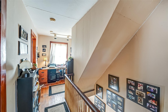 hall with light wood-style floors