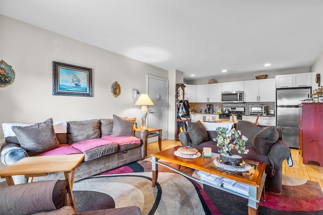 living room featuring light parquet floors