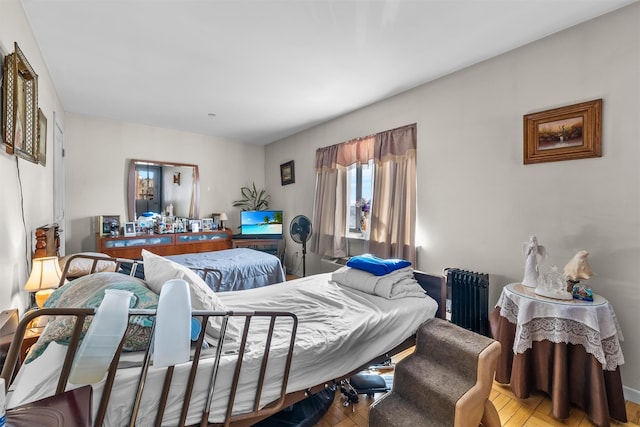 bedroom featuring radiator heating unit