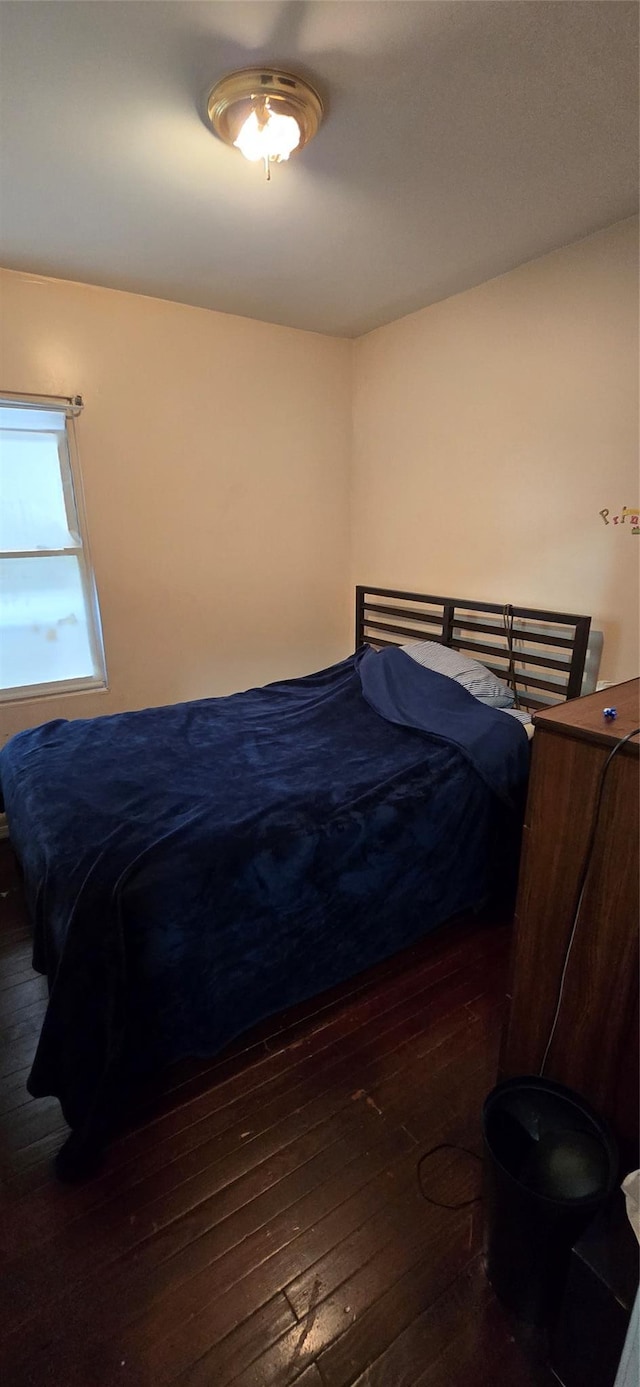 bedroom featuring hardwood / wood-style flooring