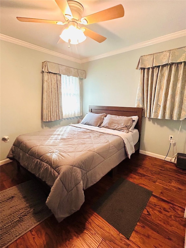 bedroom featuring crown molding, ceiling fan, and hardwood / wood-style floors