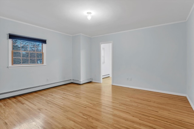 empty room with crown molding, a baseboard heating unit, and light hardwood / wood-style flooring