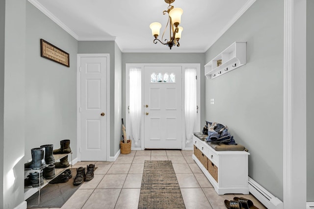 foyer entrance with baseboards, ornamental molding, baseboard heating, a notable chandelier, and light tile patterned flooring