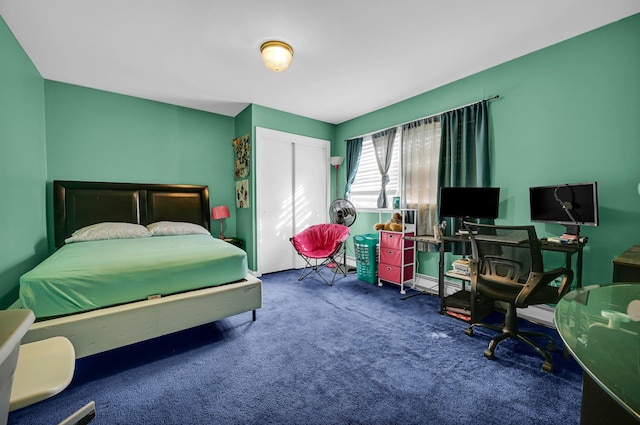 bedroom featuring a closet and carpet flooring