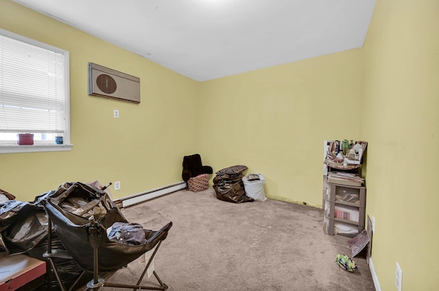 misc room featuring carpet, a baseboard radiator, and baseboards