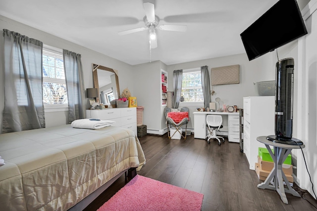 bedroom with dark wood-style floors and ceiling fan