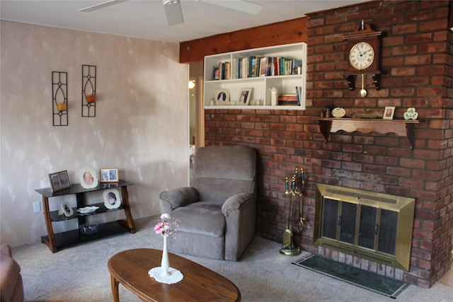 carpeted living room featuring heating unit, a brick fireplace, and ceiling fan