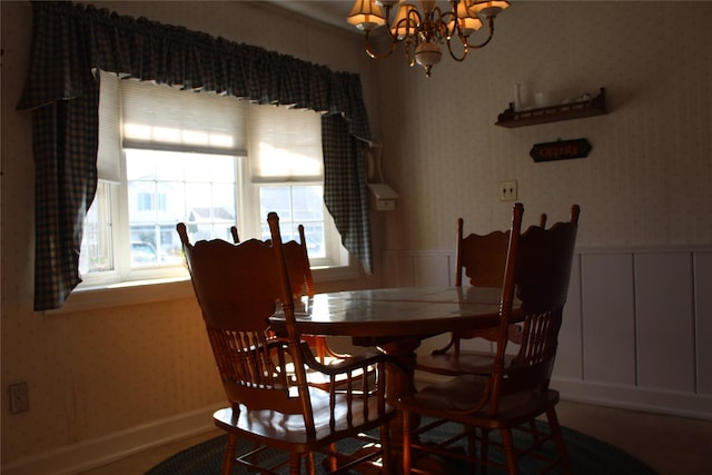 dining room with a notable chandelier