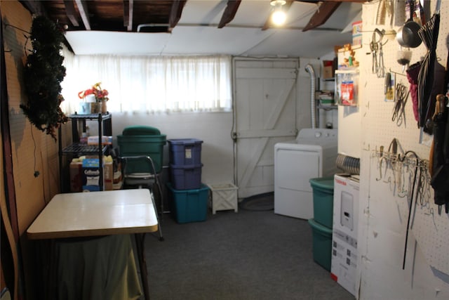 basement with washer / dryer and carpet