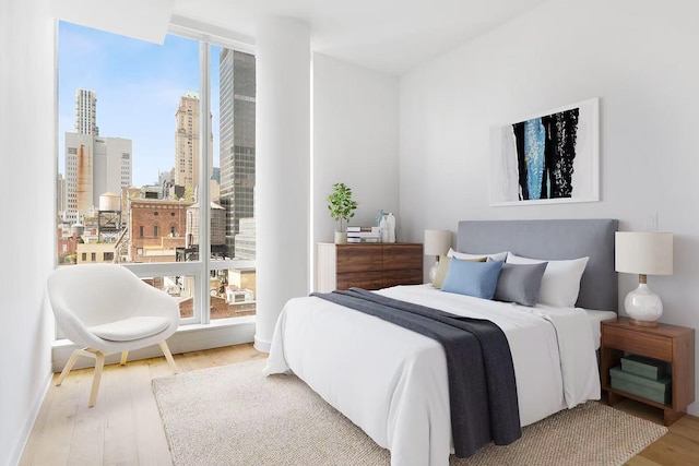 bedroom featuring hardwood / wood-style floors