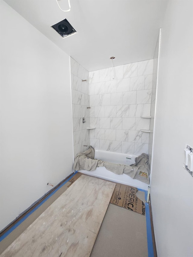 bathroom with shower / washtub combination