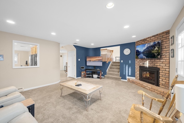 carpeted living room with a baseboard radiator and a brick fireplace