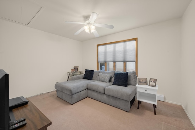 living room featuring light carpet and ceiling fan