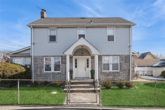 view of property with a front lawn