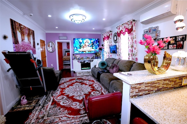 living room featuring ornamental molding and a wall unit AC